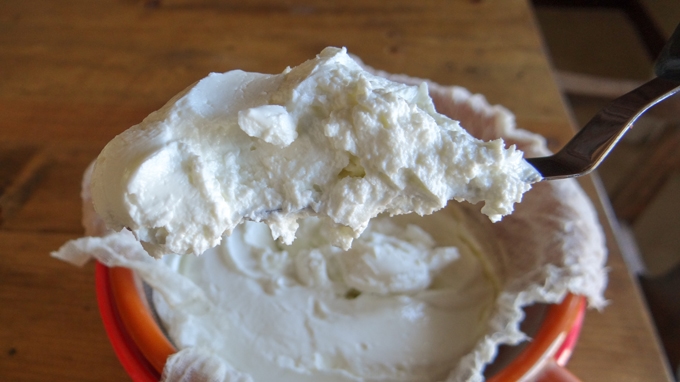 The dry Greek yogurt after straining.